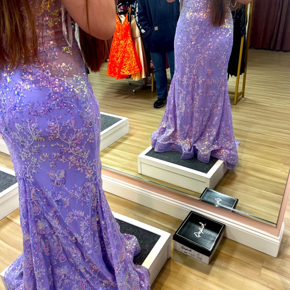 Bought from emma and kaits! size 14! only wore once bought it for $600!